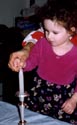 Lighting her candle